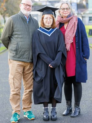 Emily Harrington with her parents Michael and Jennifer. Photo: michaelorourkephotography.ie