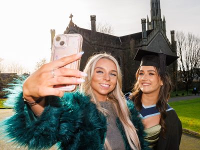 Graduate Erika Hutchinson gets a selfie with Mia Morrison. Photo: michaelorourkephotography.ie